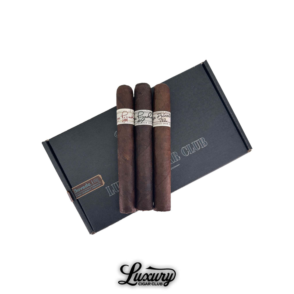 Liga Privada Toro cigar sampler featuring three premium cigars on a black Luxury Cigar Club box with Boveda humidity pack.