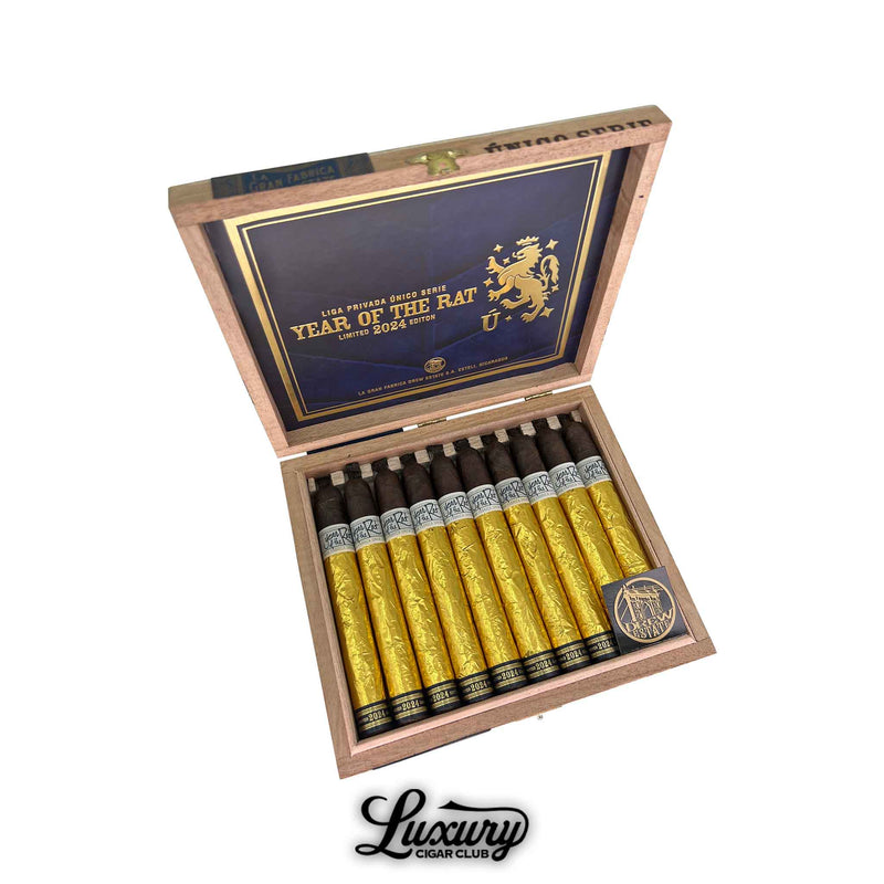 Liga Privada Único Serie Year of the Rat Limited 2024 Edition cigars displayed in an elegant wooden box with gold foil wrappers and blue interior, available at Luxury Cigar Club.