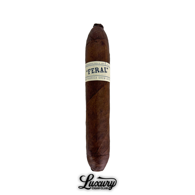 Single Liga Privada Único Series Feral Flying Pig cigar with dark wrapper, chunky vitola, and signature pigtail cap, presented with Luxury Cigar Club branding.