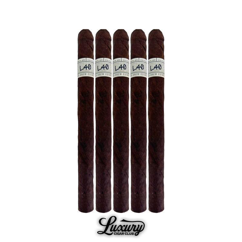 Five Liga Privada Único Serie L40 Lancero cigars standing upright, featured by Luxury Cigar Club.