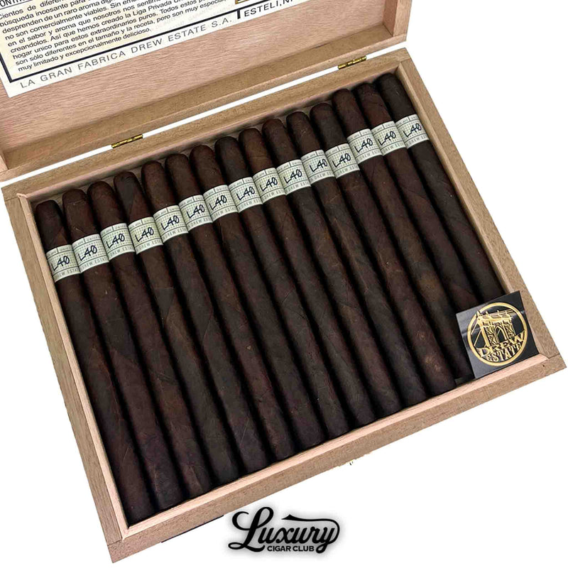 Close up of Liga Privada Único Serie L40 Lancero box showing cigars and branding, from Luxury Cigar Club.
