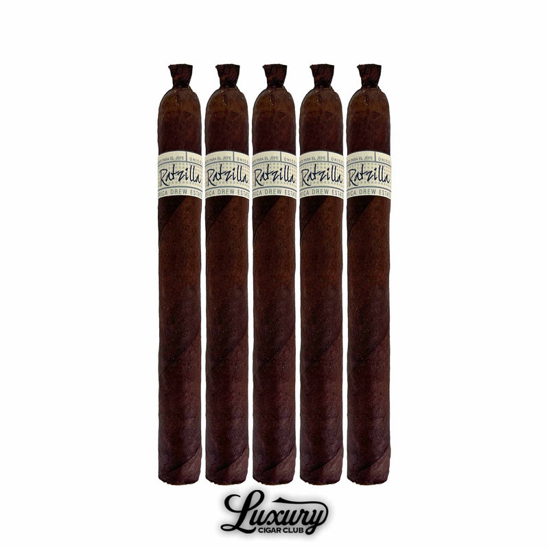 Five Liga Privada Único Series Ratzilla cigars aligned vertically, long dark wrappers with pigtail caps, each banded with white “Ratzilla” label, Luxury Cigar Club logo beneath.