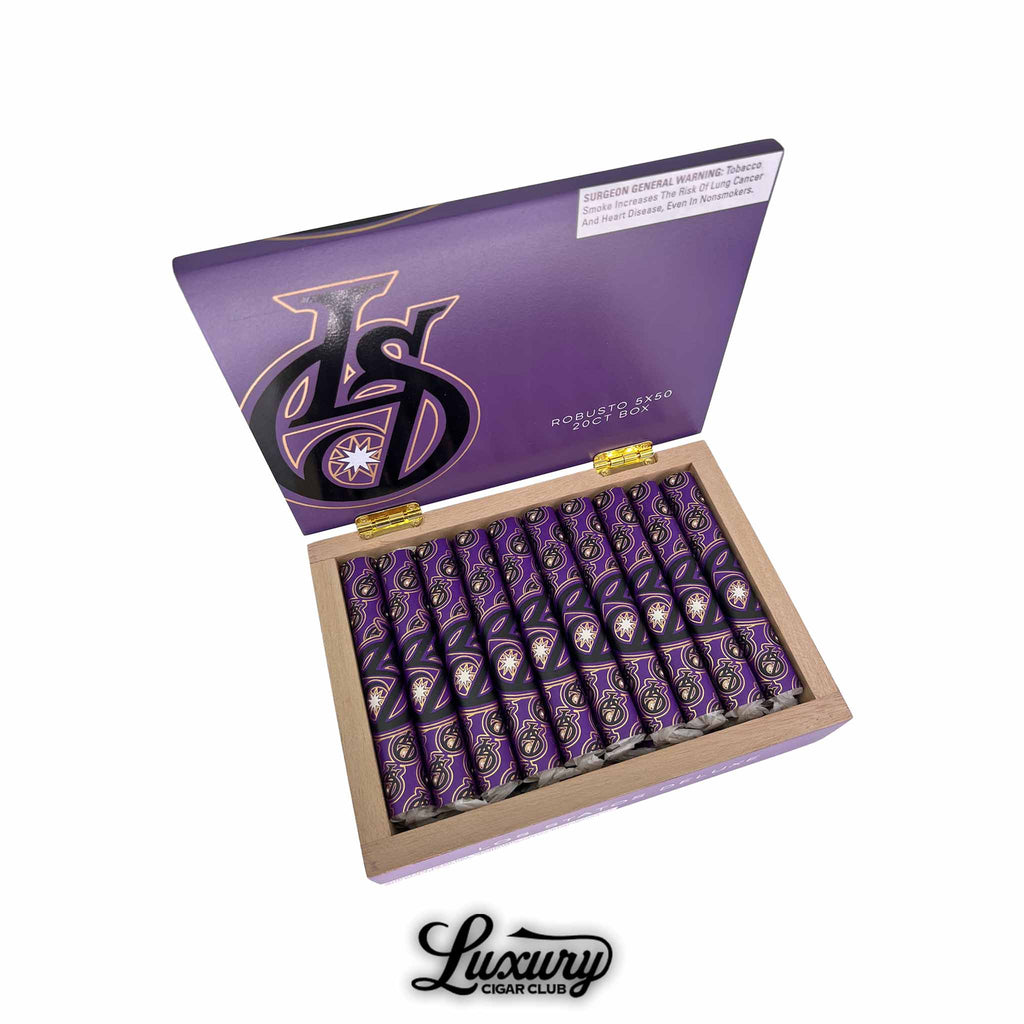 Los Statos Deluxe Connecticut Robusto cigars displayed in an open purple box with gold and black accents, showcasing elegant purple-banded cigars, presented by Luxury Cigar Club.