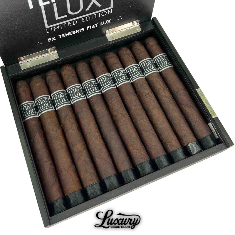 Close-up of Luciano Fiat Lux Tenebrus Limited Edition cigars in an open black box, featuring dark premium wrapper and elegant bands from Luxury Cigar Club.