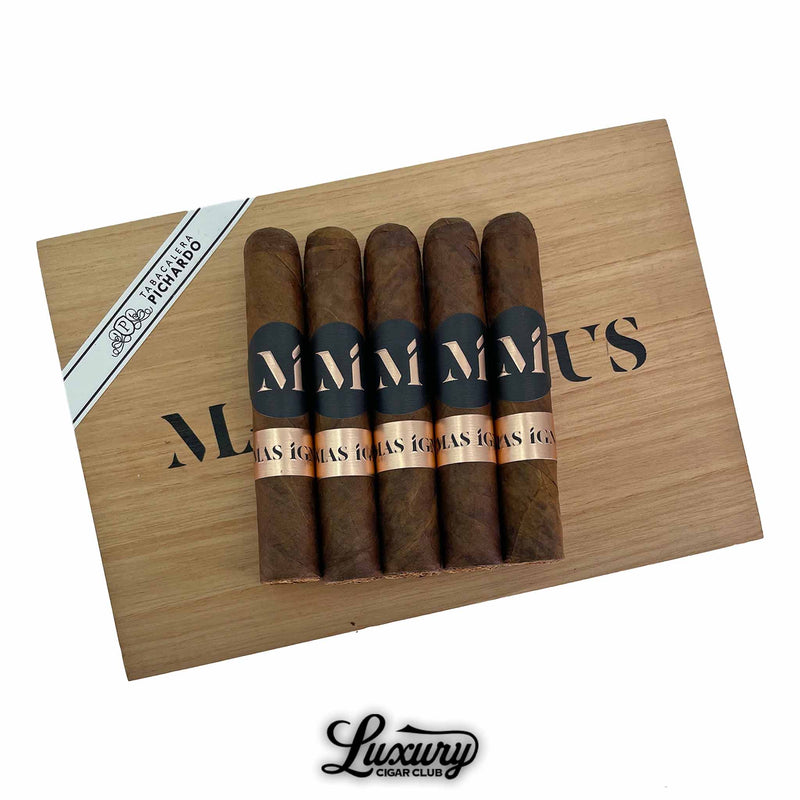 Five Luciano Mas Igneus Short Robusto cigars with dark brown wrappers and bold black and copper bands, displayed on a branded wooden box by Luxury Cigar Club.
