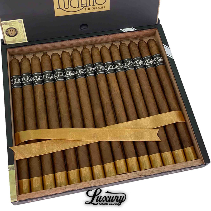 Close-up of Luciano The Dreamer Lancero cigars in an open luxury box with gold ribbon and foot bands, premium hand-rolled cigars available online at Luxury Cigar Club.