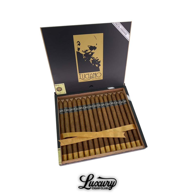 Open box of Luciano The Dreamer Lancero cigars, featuring elegant long cigars with dark bands and golden foot ribbons, displayed at Luxury Cigar Club for premium cigar enthusiasts.