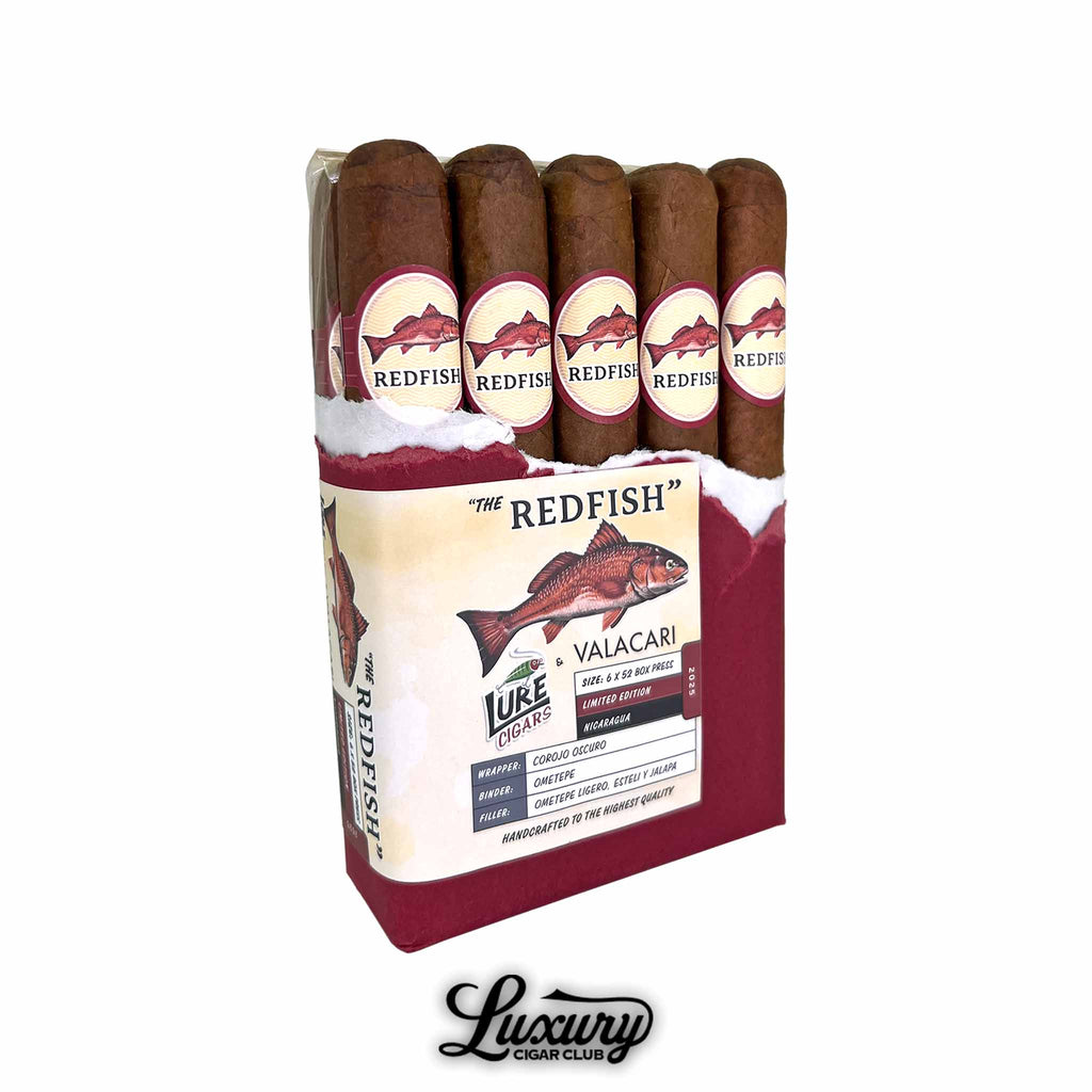 Lure & Valacari Redfish Limited Edition Toro Box Pressed cigars partially unwrapped in red packaging with detailed fish label, revealing premium box-pressed cigars.