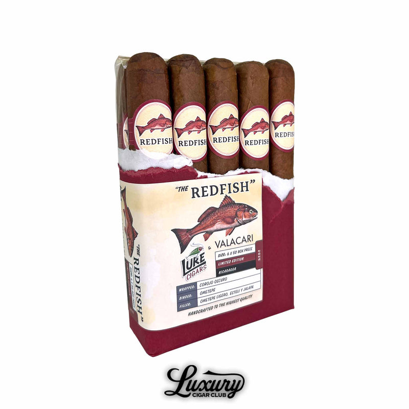 Lure & Valacari Redfish Limited Edition Toro Box Pressed cigars partially unwrapped in red packaging with detailed fish label, revealing premium box-pressed cigars.