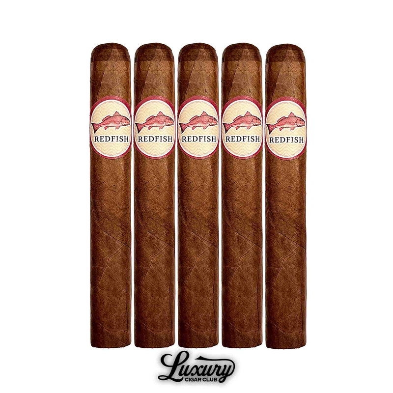 Five hand-rolled Redfish Toro cigars with brown Corojo Oscuro wrapper, band featuring redfish illustration and “Redfish” text, presented for online catalog with Luxury Cigar Club logo.