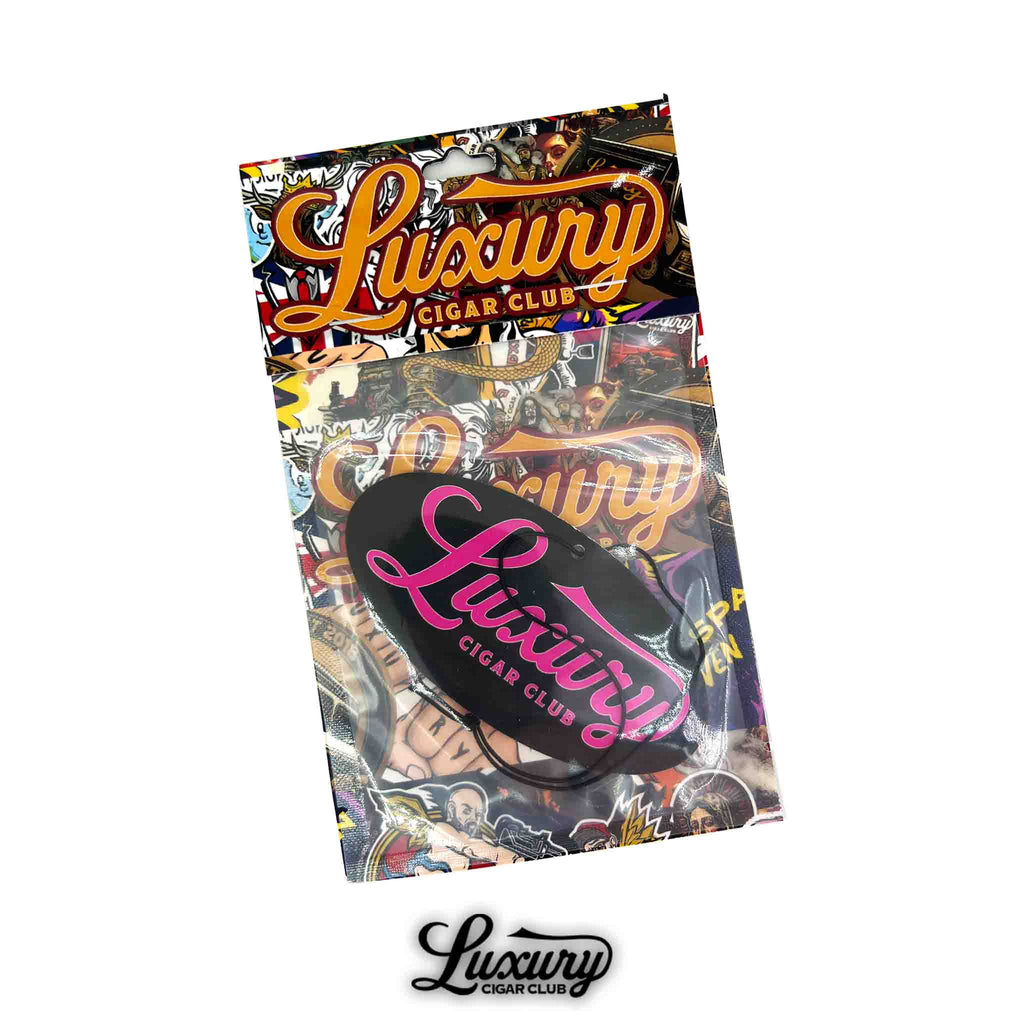 Front view of Luxury Cigar Club’s sandalwood air freshener in retail packaging, featuring a bold multicolor design with the Luxury logo prominently displayed.