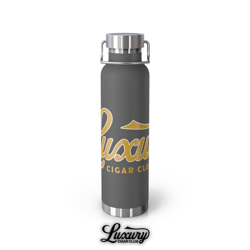Luxury Cigar Club copper vacuum insulated 22oz bottle in matte grey with gold logo front view