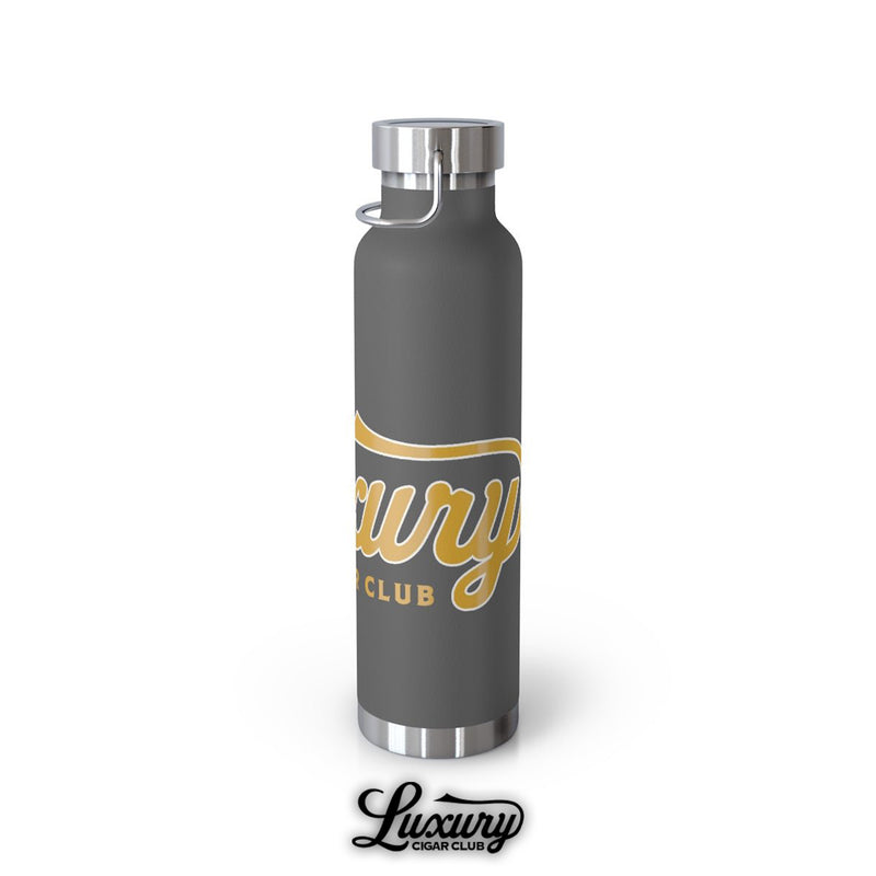 Luxury Cigar Club copper vacuum insulated 22oz bottle in matte grey with large gold script logo side view