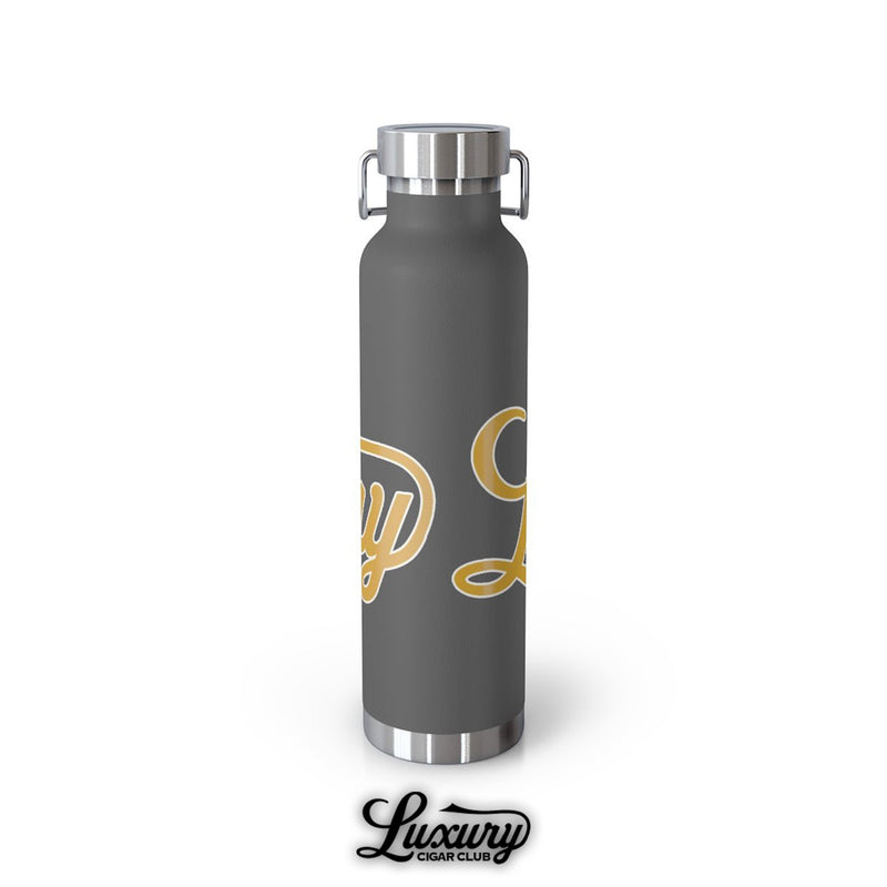 Luxury Cigar Club copper vacuum insulated 22oz bottle in matte grey with gold design rotated back view
