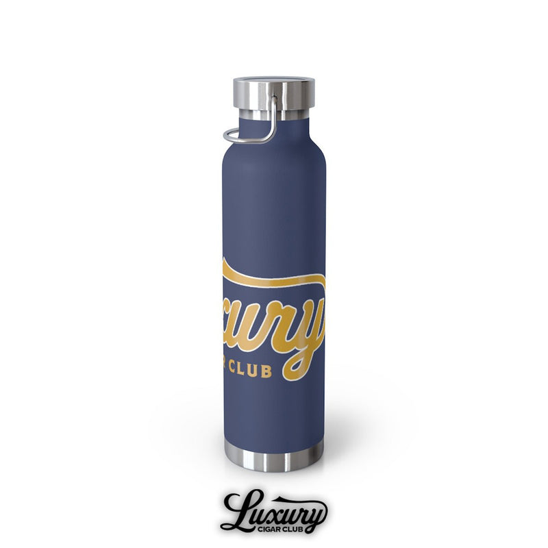 Rotated view of Luxury Cigar Club navy copper vacuum insulated bottle showing large gold logo text wrapping around