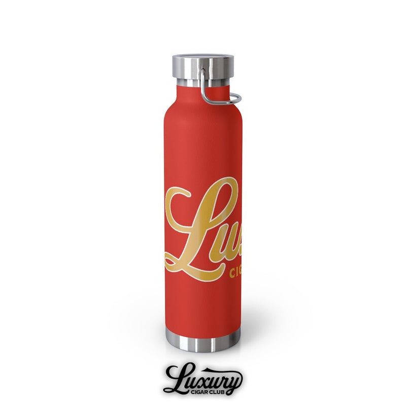Luxury Cigar Club copper vacuum 22oz insulated bottle in red with gold logo angled side view stainless steel lid