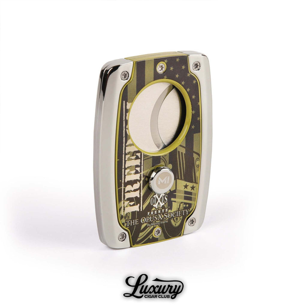 Manny Iriarte Opus X Society Freedom Cutter by Luxury Cigar Club featuring patriotic design, stainless steel blades, and luxury cigar accessory branding.