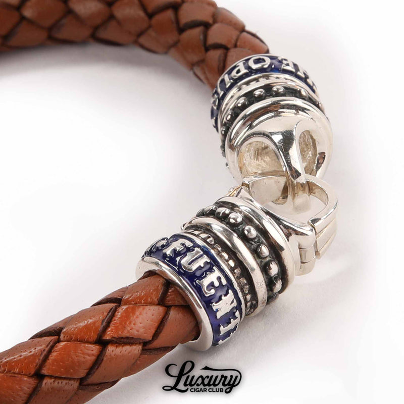 Detailed view of clasp on Manny Iriarte Opus X Society camel leather bracelet with blue “Fuente” accents, cigar accessory at Luxury Cigar Club.