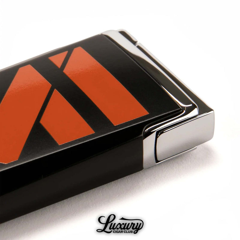 Close up of Manny Iriarte Opus X Society MI lighter by Elie Bleu black lacquer with bold orange design luxury cigar club accessory