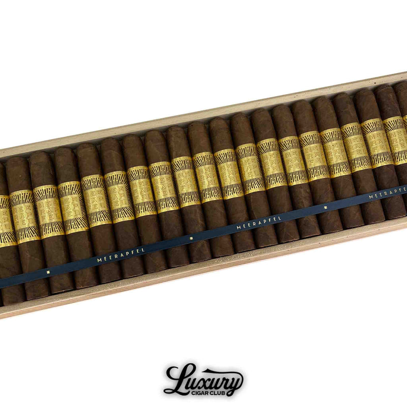 Meerapfel Master Blend Meir Limited Edition Robusto cigars arranged in a box with luxurious gold bands and dark wrappers, presented by Luxury Cigar Club.
