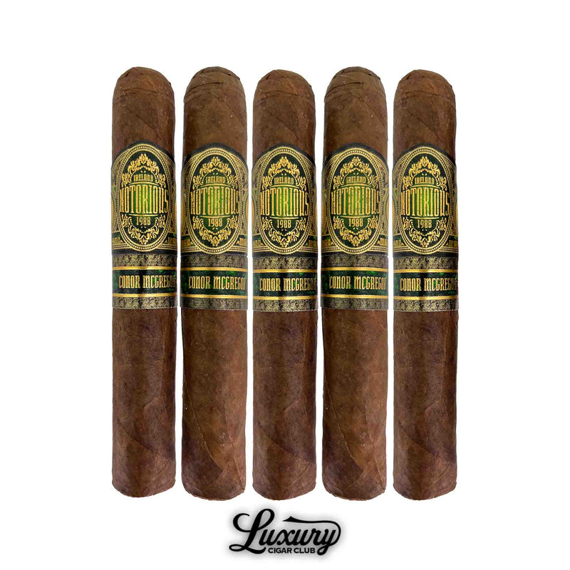 Notorious Double Robusto cigars by Conor McGregor arranged in a five-pack with rich brown tobacco and ornate black-and-gold bands, by Luxury Cigar Club.