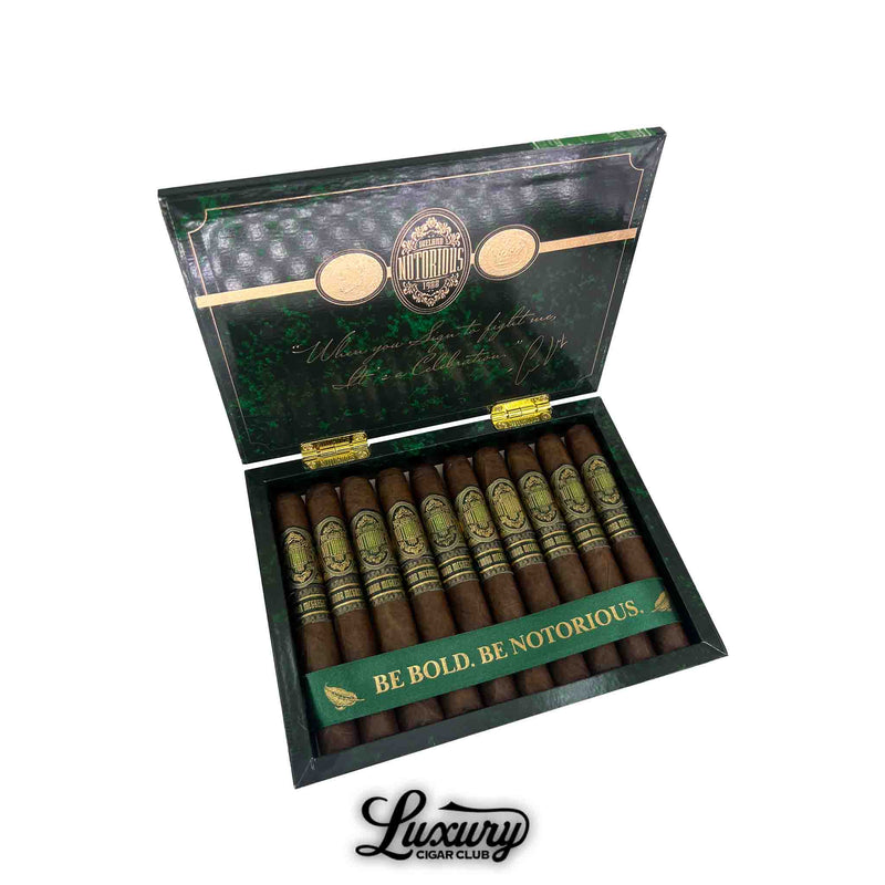 Open box of Notorious Conor McGregor Corona Gordo cigars with bold green and gold branding, presented by Luxury Cigar Club.