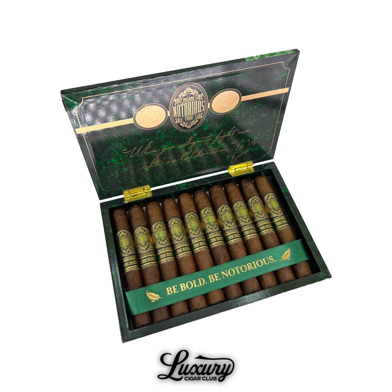 Box of Notorious Conor McGregor Double Robusto cigars with bold gold branding and “Be Bold. Be Notorious.” green ribbon.