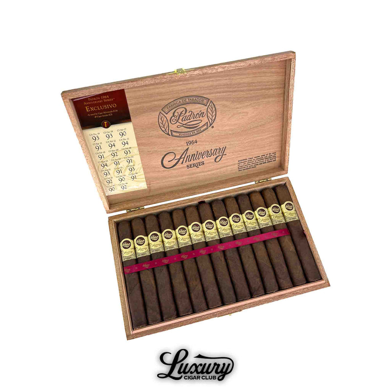 Open wooden box of Padron 1964 Anniversary Series Maduro Exclusivo cigars, showcasing dark wrappers and gold labels, with a red ribbon and rating panel inside the lid. Luxury Cigar Club branding below.