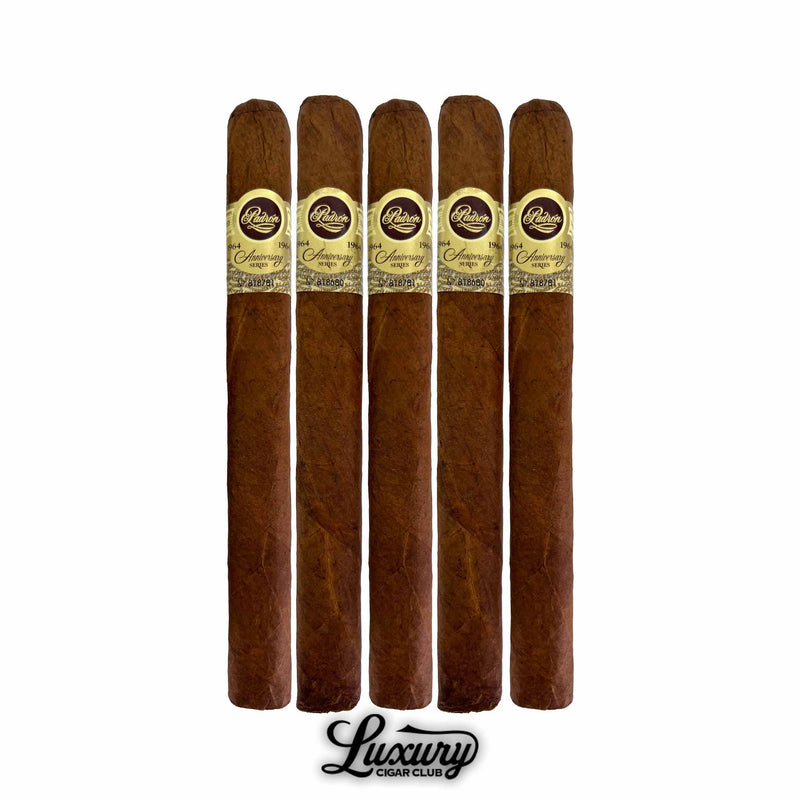 Five Padron 1964 Anniversary Series Natural Diplomatico cigars arranged in a row, showing the box-pressed profile, natural wrapper, and detailed gold anniversary labeling for Luxury Cigar Club.