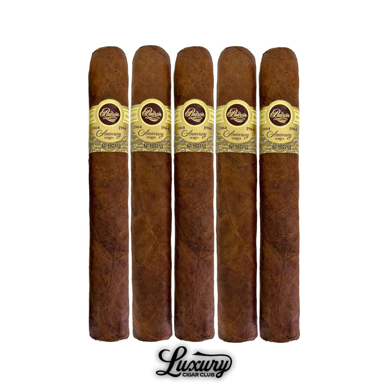 Five Padron 1964 Anniversary Series Natural No. 4 cigars lined up with classic anniversary bands, showing the medium-brown natural wrapper and box-pressed shape for Luxury Cigar Club product display.