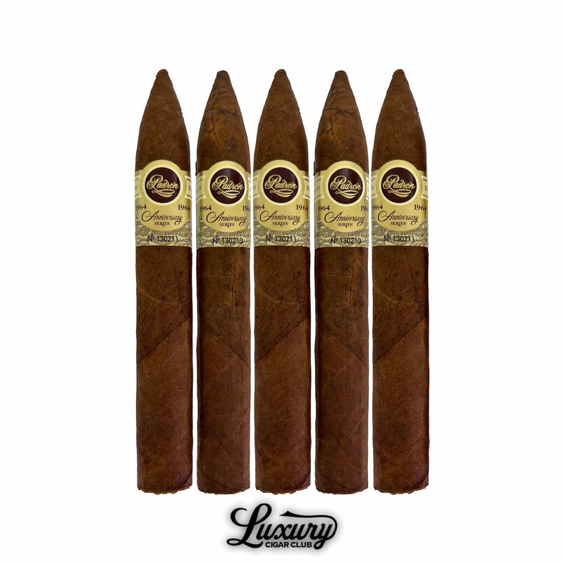 Five Padron 1964 Anniversary Series Natural Torpedo cigars standing in a row, highlighting the pointed head, natural wrapper, and gold anniversary labels in a Luxury Cigar Club presentation.