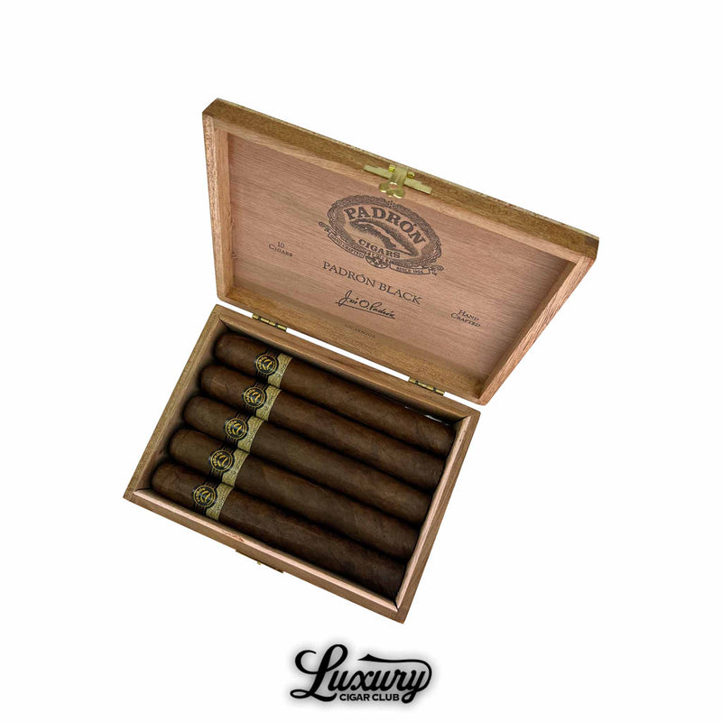 Open wooden box of Padron Black Maduro Unicorn PB99 cigars arranged neatly with bold black and gold bands, Luxury Cigar Club logo underneath.