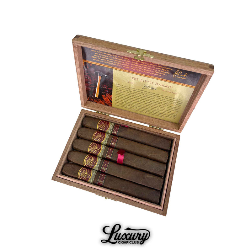 Close-up view of Padrón Family Reserve No. 44 Maduro cigars in box, highlighting rich dark wrapper and decorative cigar bands.