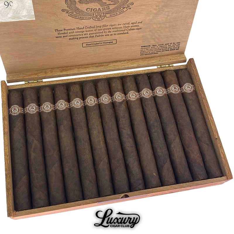 Detailed close-up of Padron Series 4000 Maduro box, highlighting the uniform construction, earthy maduro leaves, signature Padron cigar bands, and Luxury Cigar Club branding