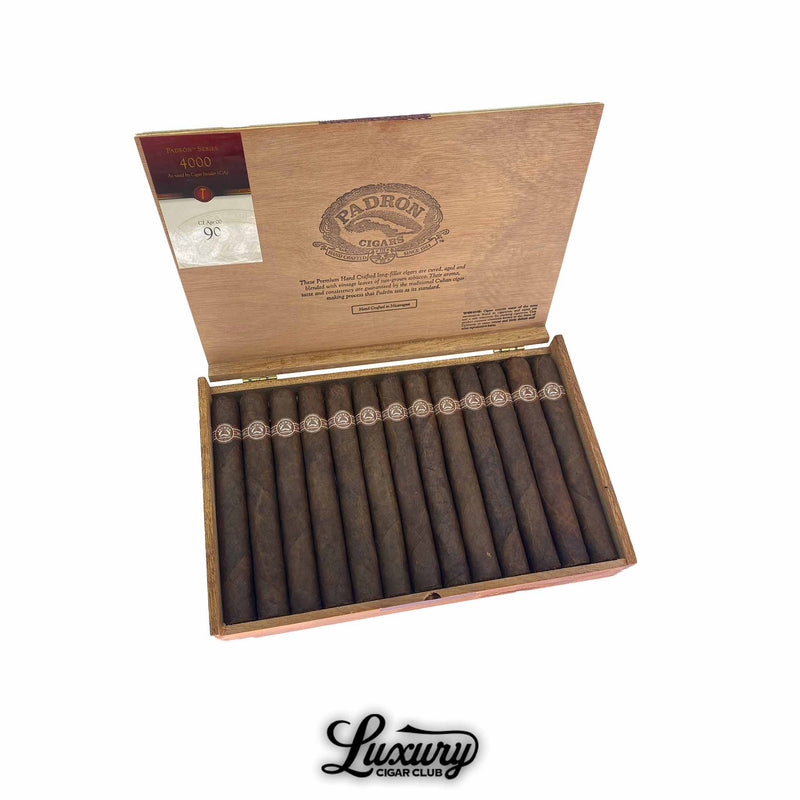 Open wooden box of Padron Series 4000 Maduro cigars, showcasing 20 premium hand-rolled Nicaraguan cigars with rich dark maduro wrappers, branded inside lid, and Luxury Cigar Club logo