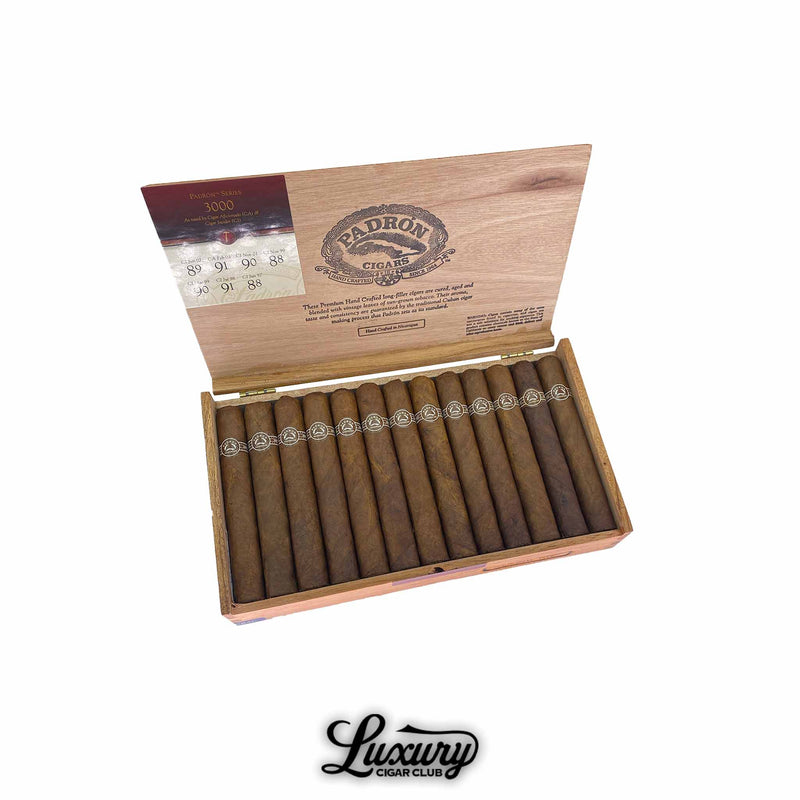 Open wooden box of Padrón Series Natural 3000 cigars, neatly arranged in two rows with brown natural wrappers, detailed cigar bands, and branded inside lid, displayed with Luxury Cigar Club logo.