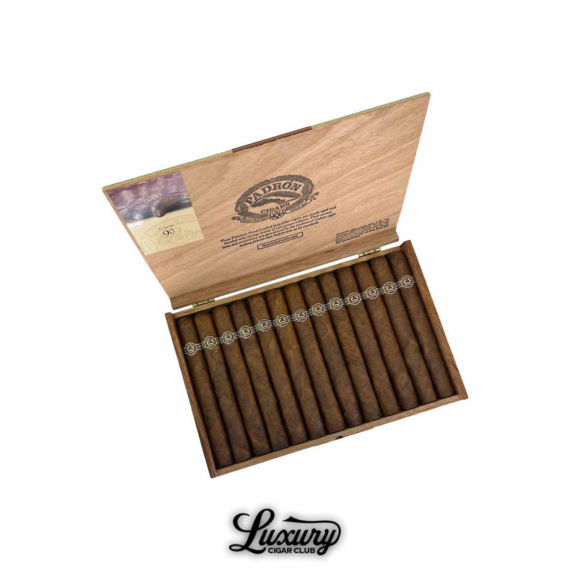 Open box of Padrón Series Natural 4000 cigars, long-format sticks with natural brown wrappers and signature Padrón bands, inside wooden box lid engraved with brand details, shown with Luxury Cigar Club logo.