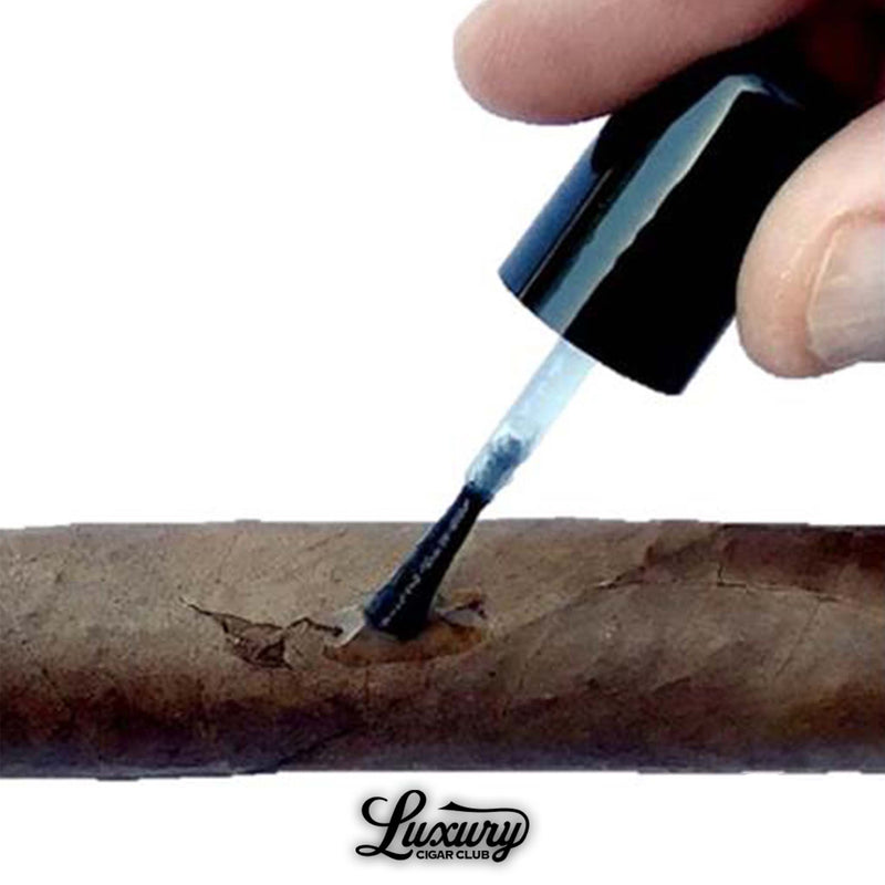 PerfecRepair cigar glue sealer applied to cracked cigar wrapper for easy repair at Luxury Cigar Club