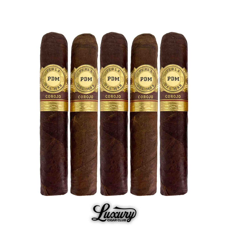 five Perla Del Mar Corojo Robusto cigars standing upright with rich brown wrappers and gold bands shown by Luxury Cigar Club