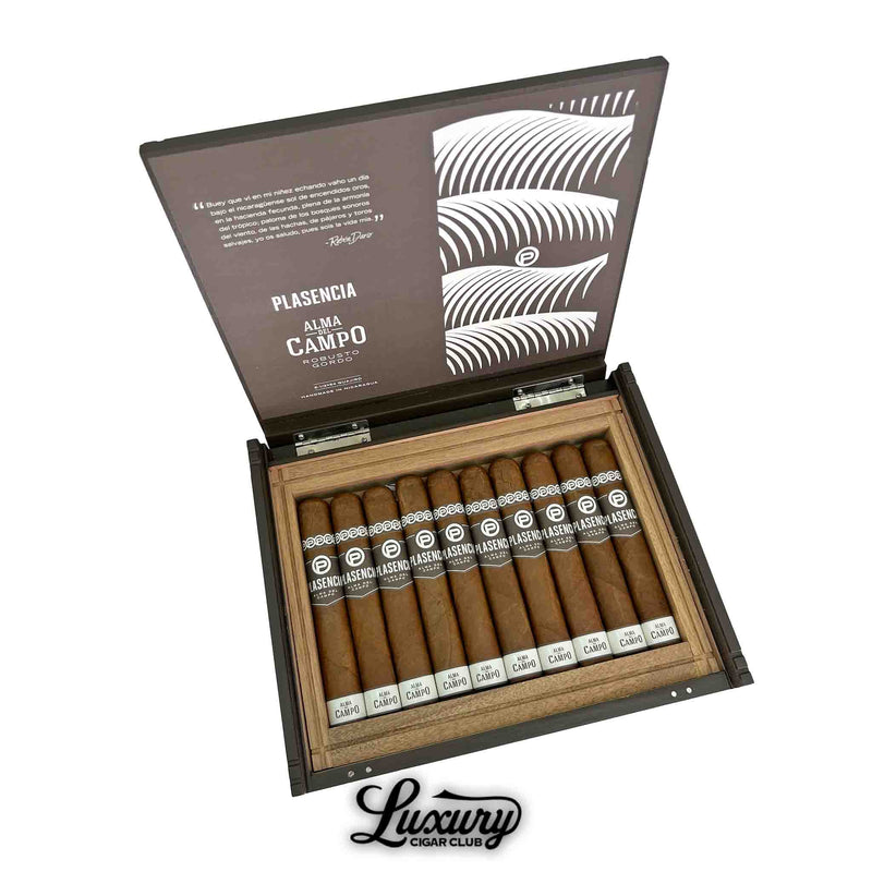 Open box of Plasencia Alma del Campo Guajiro cigars with detailed lid design and neatly arranged sticks from Luxury Cigar Club