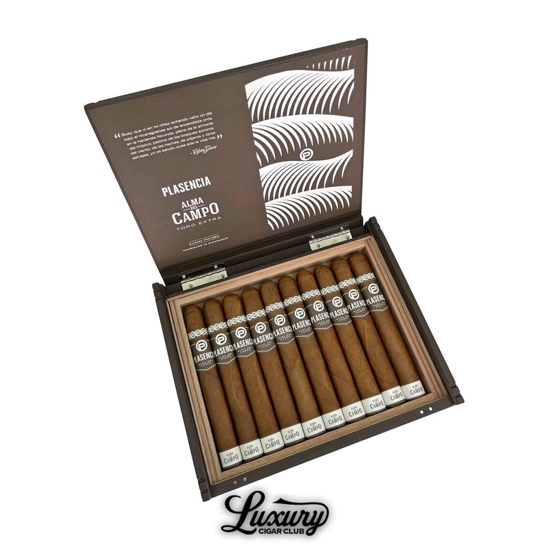 Open box of Plasencia Alma del Campo Travesía cigars with branded inner lid and cedar tray from Luxury Cigar Club