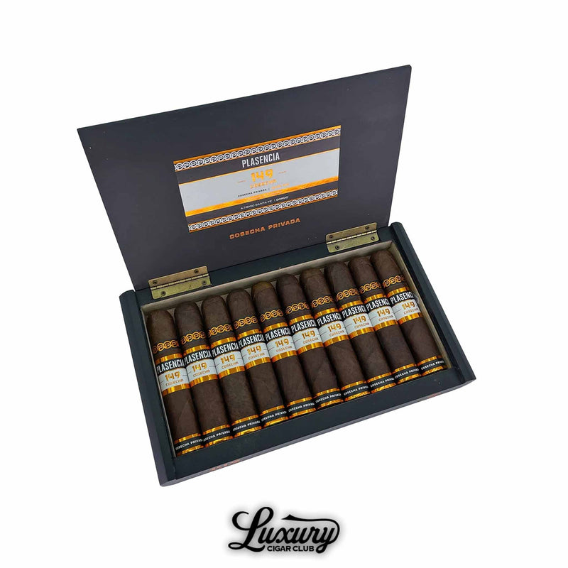 Open box of Plasencia Cosecha 149 Santa Fe cigars featuring 10 cigars with dark wrappers and orange, black, and white bands, presented in a sleek black box with gold hinges and "Luxury Cigar Club" branding.