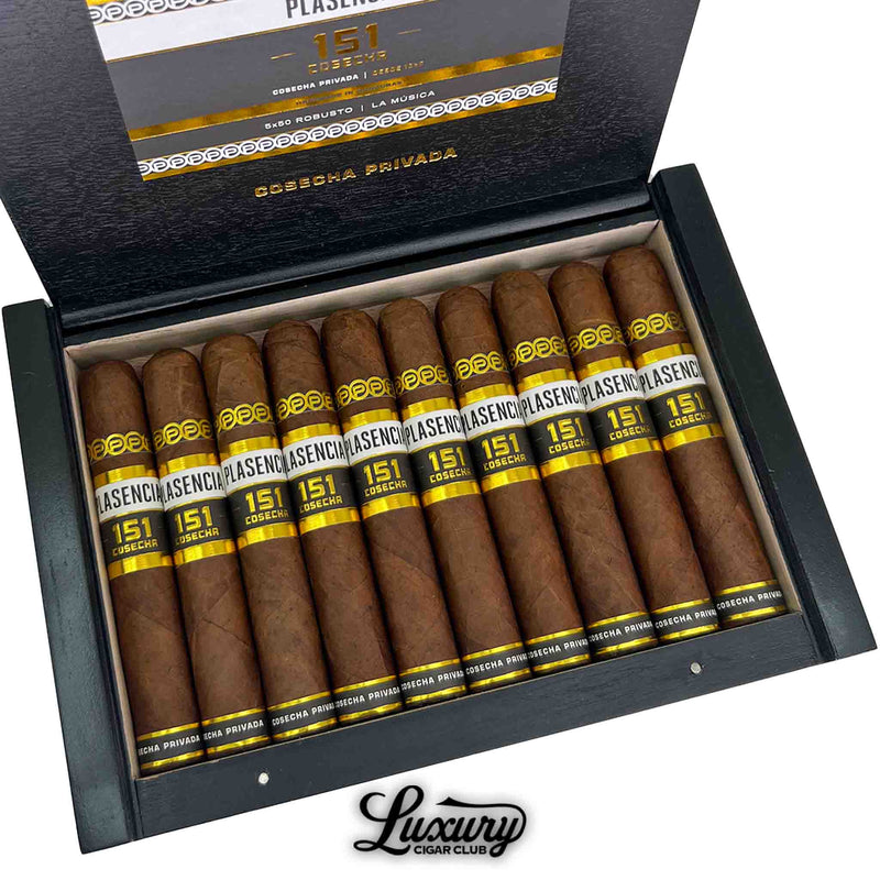 Detailed view of the open box showing 10 Plasencia Cosecha 151 La Música Robusto cigars with black and gold accents, by Luxury Cigar Club.