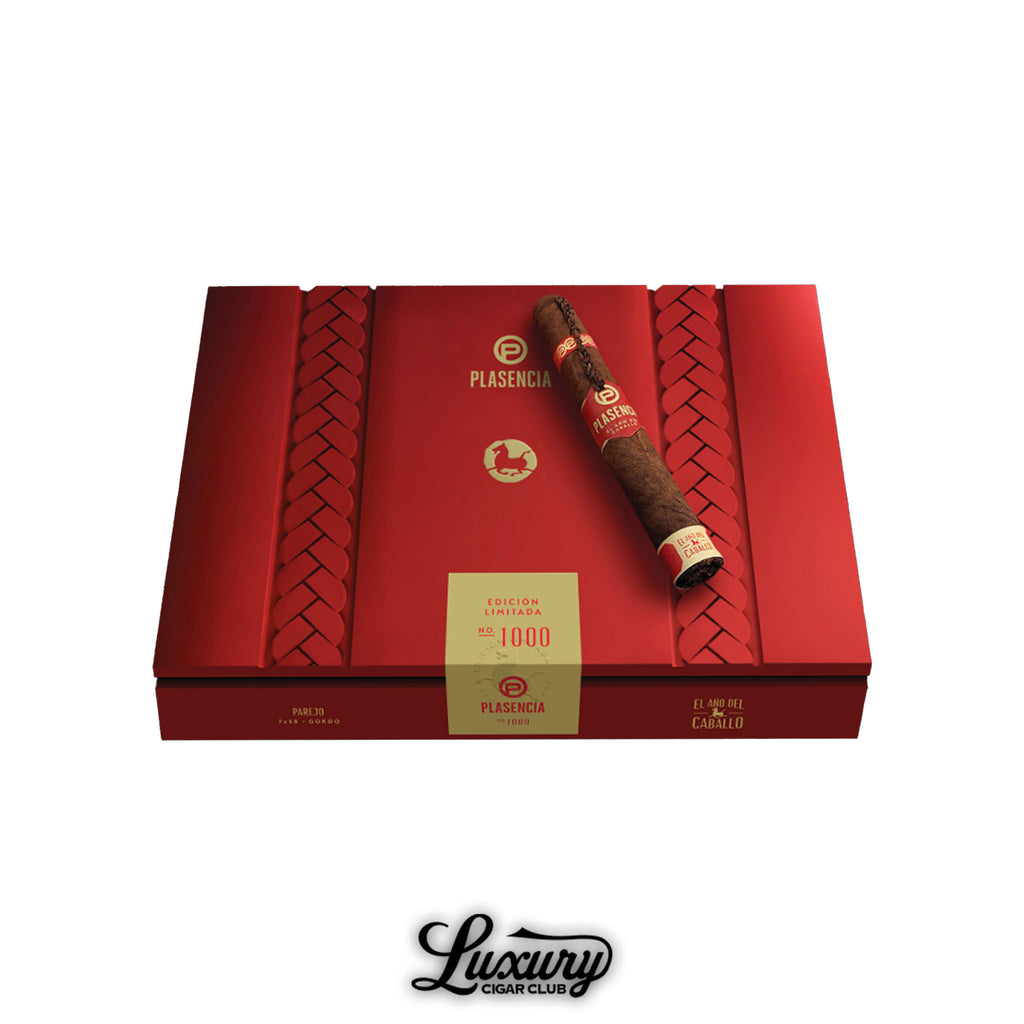 Luxury Cigar Club presents Plasencia El Año del Caballo Parejo Gordo cigar box in striking red with one cigar resting on top.
