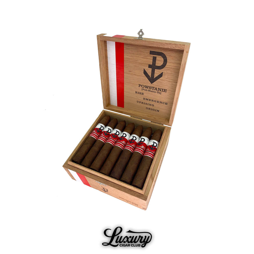 Powstanie Broadleaf Belicoso cigars in open wood box with red and white interior stripe and white red and black Powstanie bands displayed for sale by Luxury Cigar Club