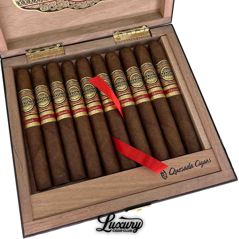 Close-up of Quesada Vega Magna Limited Production Robusto cigars highlighting the intricate gold and red band detailing and premium wrapper, from Luxury Cigar Club.
