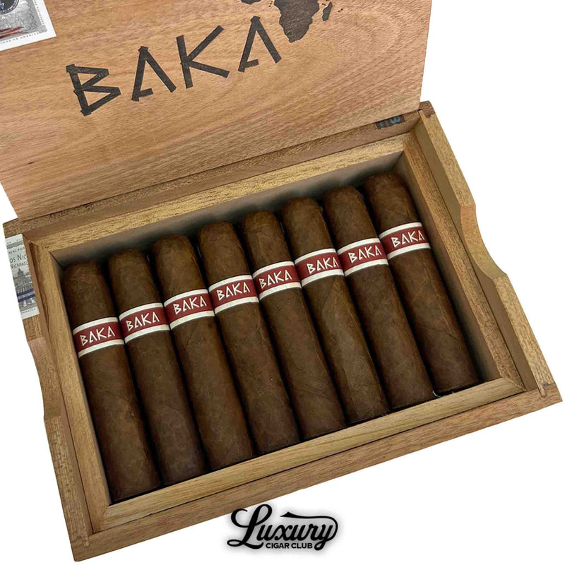Close up of RoMa Craft Baka Bantu cigars with red and white bands in a wooden box, available at Luxury Cigar Club.