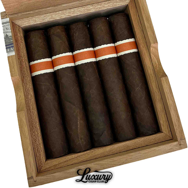 Close up of RoMa Craft Neanderthal KFG cigars showing rich dark wrappers with striking orange and white bands from Luxury Cigar Club