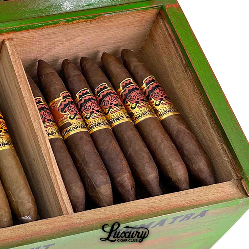 Close-up of Rojas Breakfast Tacos Sumatra Petite Salomon cigars showing the medium-brown hue and intricate band detail, offered by Luxury Cigar Club.