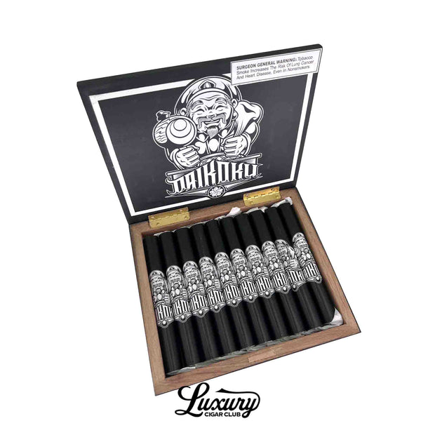 Open wooden box of Room101 Daikoku Luxury Cigar Club Exclusive Toro cigars in black tubes featuring white illustrated Daikoku artwork and matching lid design at Luxury Cigar Club.